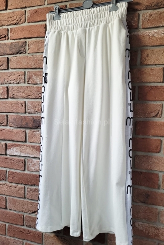 Dresowe spodnie z lampasami Minouu w Selavifashion.pl