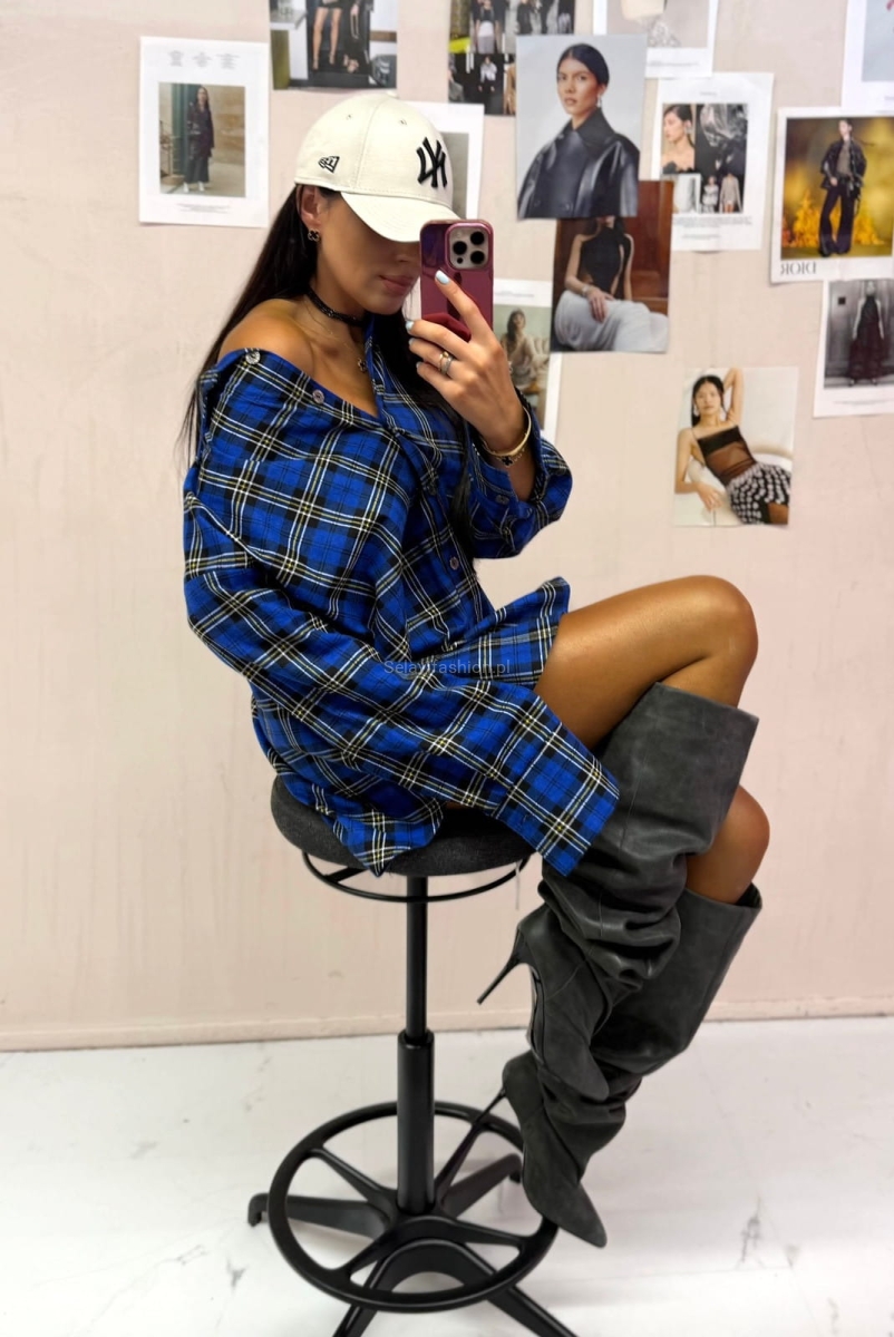 Klasyczna flanelowa koszula w kratę od LaMilla uszyta z bawełnianej tkaniny, zapinana na guziki.