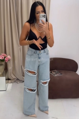 Szerokie jeansowe spodnie z dziurami La Milla niebieski